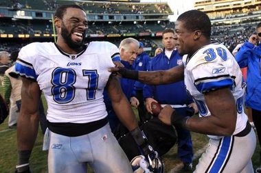 Calvin Johnson celebrating after a road win over Oakland